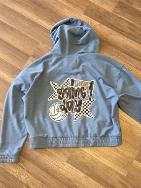 Natural Reflections Light Blue Graphic Hoodie with Game Day Design